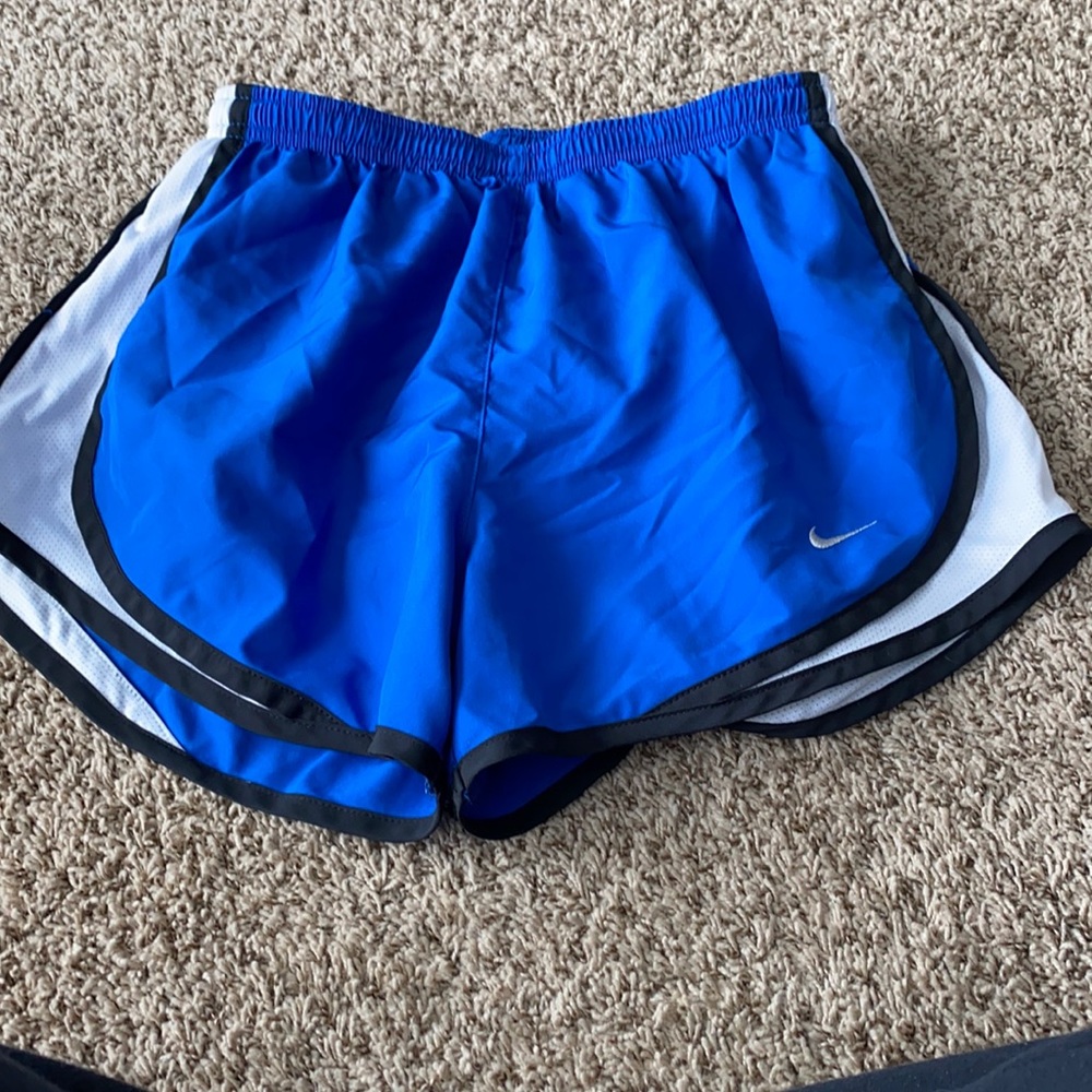 Blue Nike track shorts NWOT -small flaw